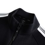W TRAINING WOVEN TRACK TOP